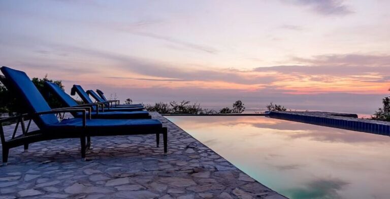 Infinity pool at sunset at Elephant Plains Lodge, Queen Elizabeth National Park