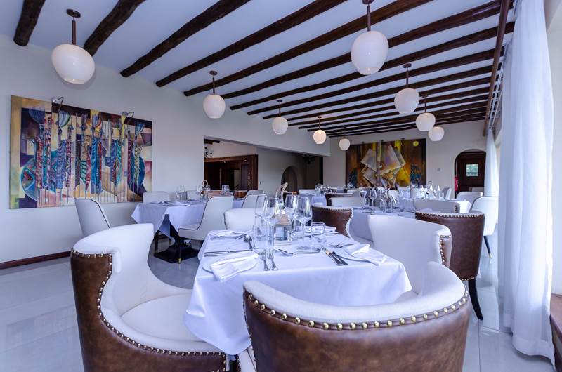 Hotel No. 5 Entebbe: Amazing Boutique Stay 10 Minutes From the Airport Restaurant and dining area at Hotel No. 5 Entebbe