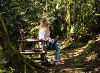 Where Is Bwindi | Tulambule Where is Bwindi? A traveller resting on a forest trail in Bwindi Impenetrable National Park
